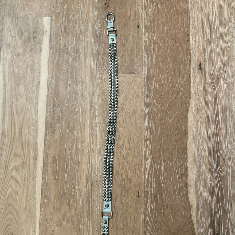 Teal embellished belt with grommets size medium‎